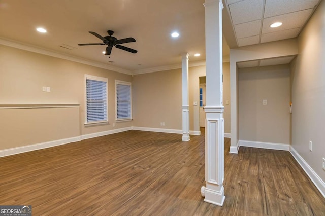 unfurnished living room featuring hardwood / wood-style flooring, ceiling fan, ornamental molding, and decorative columns