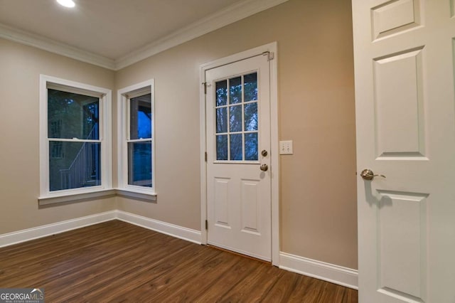 doorway to outside with crown molding and dark wood-type flooring