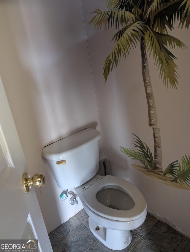 bathroom featuring toilet