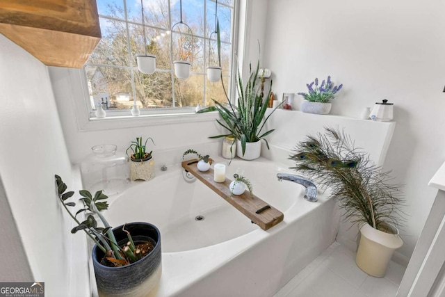 bathroom with a washtub