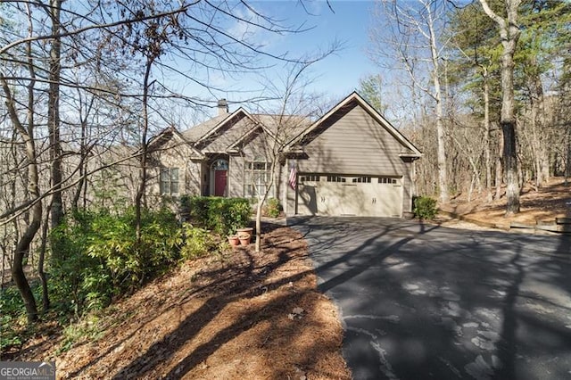 view of front of property with a garage