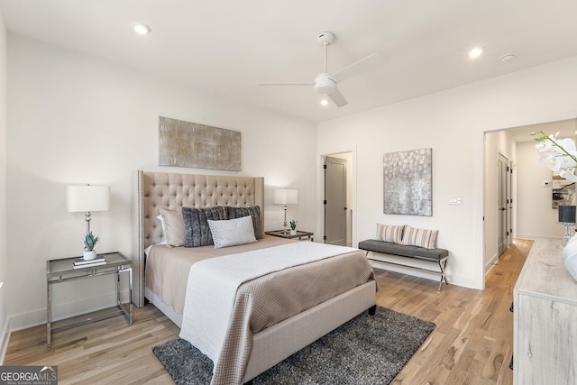 bedroom featuring ceiling fan and light hardwood / wood-style floors