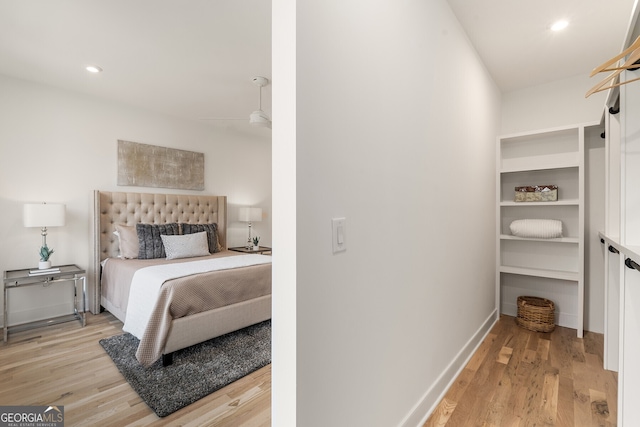 bedroom with light hardwood / wood-style flooring