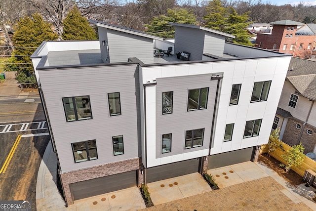 view of building exterior featuring a garage