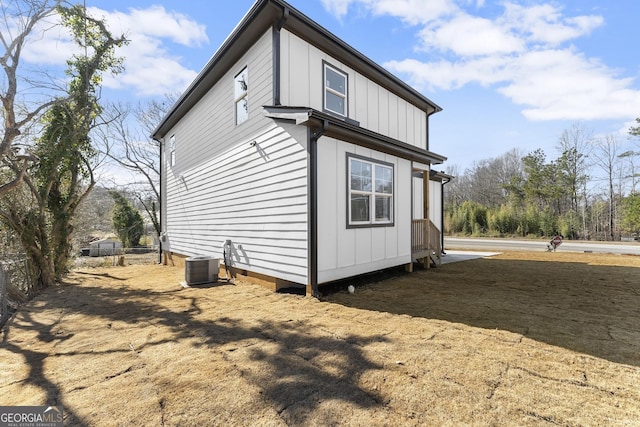 view of home's exterior with central AC