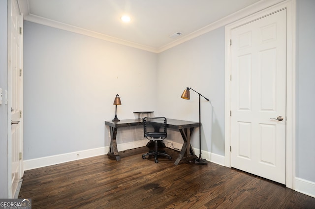 home office with dark wood-type flooring and ornamental molding