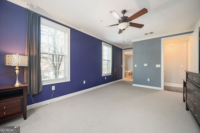 unfurnished bedroom with crown molding, light carpet, and ceiling fan