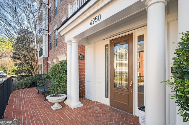 doorway to property featuring a porch