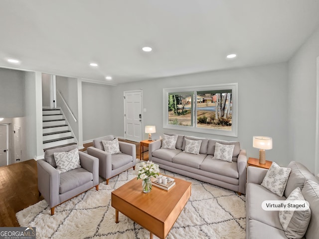 living room with light hardwood / wood-style floors