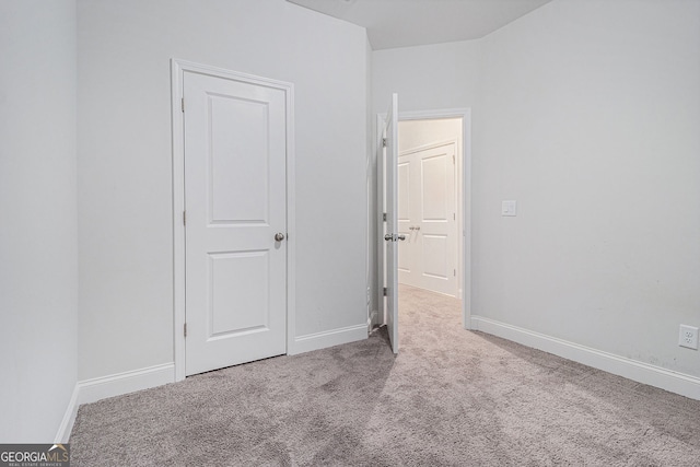 unfurnished bedroom featuring carpet floors