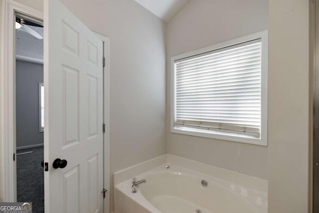 bathroom featuring a tub