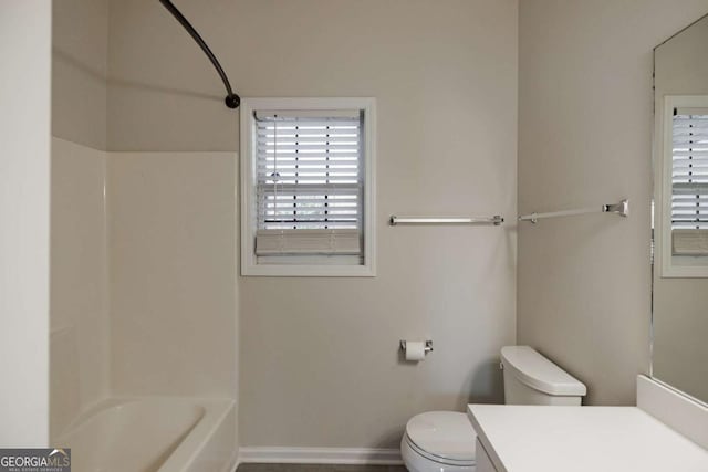 full bathroom featuring vanity,  shower combination, and toilet