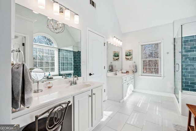 bathroom with an enclosed shower, a chandelier, vaulted ceiling, vanity, and tile patterned flooring