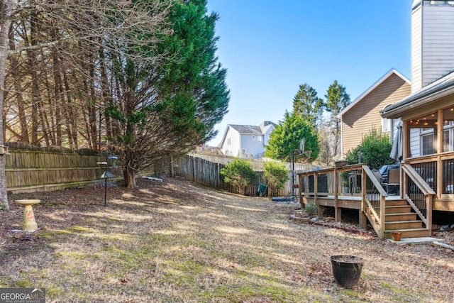 view of yard featuring a deck