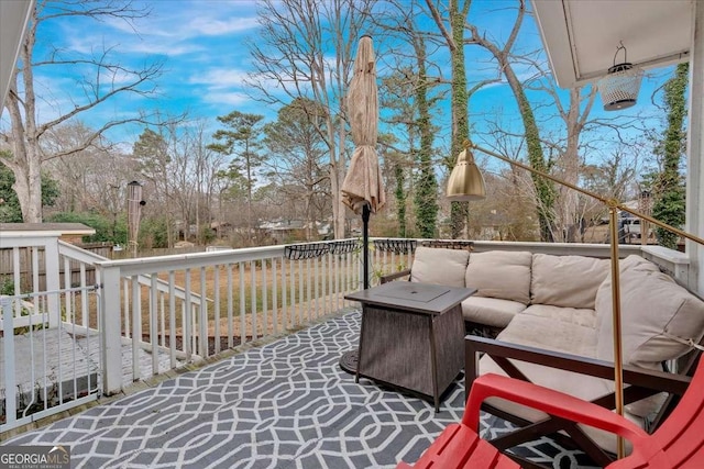 deck featuring an outdoor living space