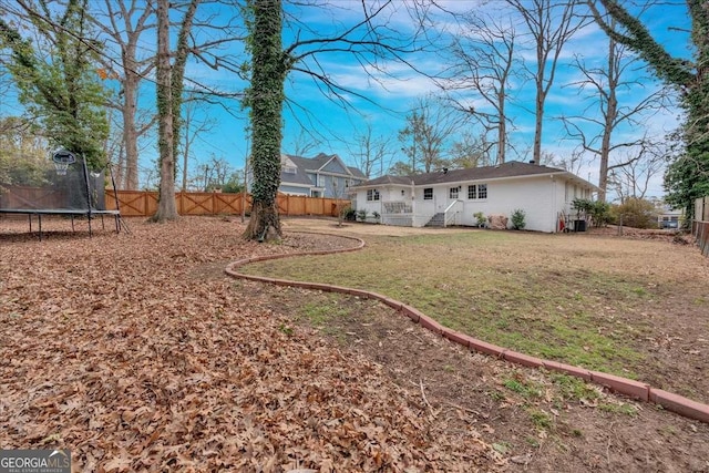 view of yard featuring a trampoline