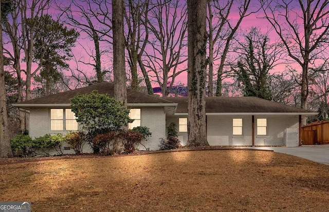 ranch-style house with a carport