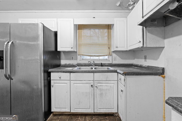 kitchen featuring extractor fan, sink, white cabinets, and stainless steel fridge with ice dispenser