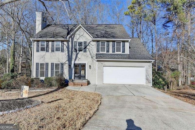 view of front of home featuring a garage