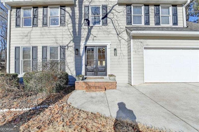 entrance to property featuring a garage