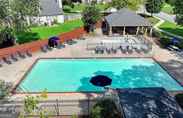 view of pool with a gazebo, a lawn, and a patio