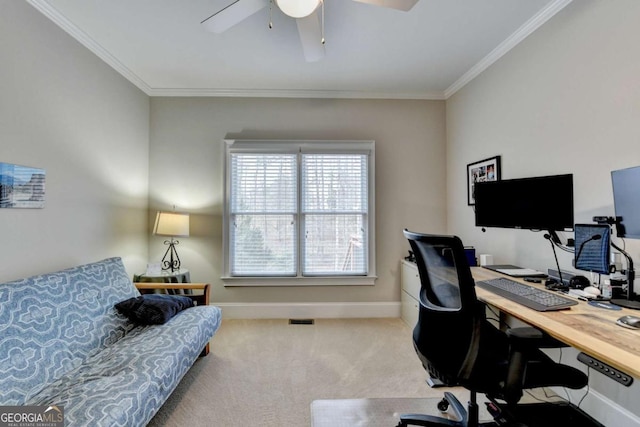 office featuring crown molding, light colored carpet, and ceiling fan