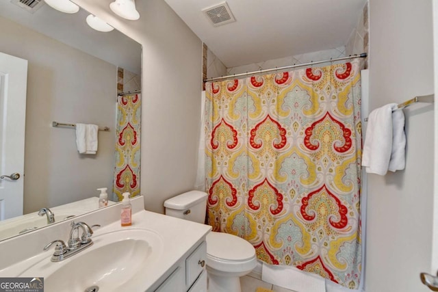 bathroom with vanity, toilet, and a shower with shower curtain