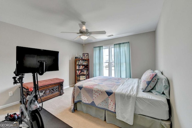 carpeted bedroom featuring ceiling fan