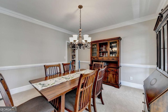 carpeted dining room with crown molding and a notable chandelier