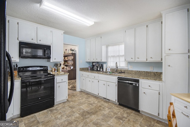 kitchen with white cabinets, sink, a textured ceiling, and black appliances