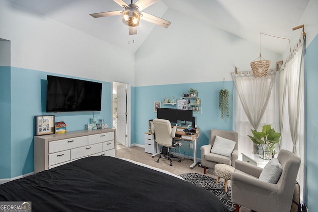 bedroom with ceiling fan, high vaulted ceiling, and light carpet