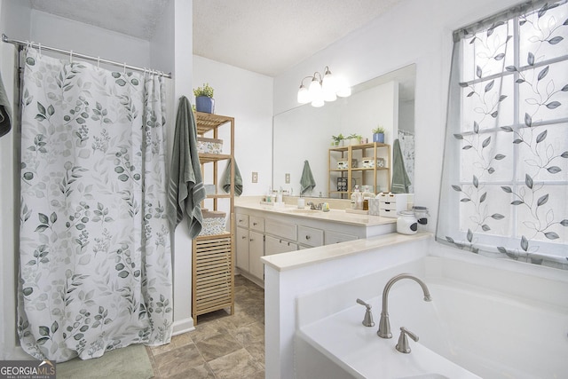 bathroom featuring vanity, shower with separate bathtub, and a textured ceiling