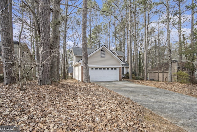 view of property exterior featuring a garage