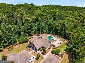 drone / aerial view with a view of trees