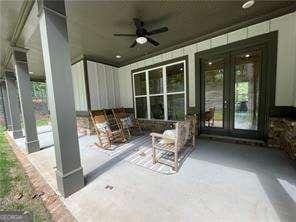 view of patio with ceiling fan and french doors