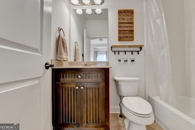 full bathroom with tile patterned flooring, vanity, shower / bath combo with shower curtain, and toilet