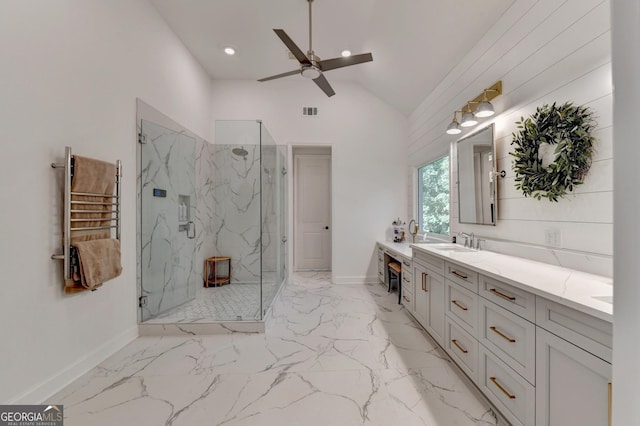 bathroom featuring vanity, a shower with shower door, lofted ceiling, and ceiling fan