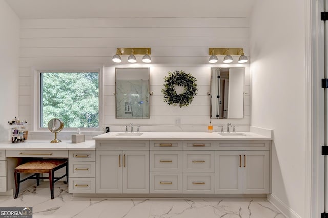 bathroom featuring vanity and wood walls