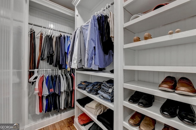 walk in closet featuring hardwood / wood-style floors