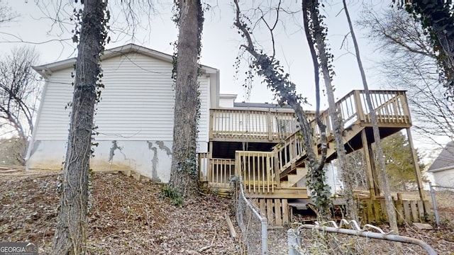 rear view of property with a deck