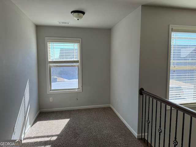 view of carpeted spare room