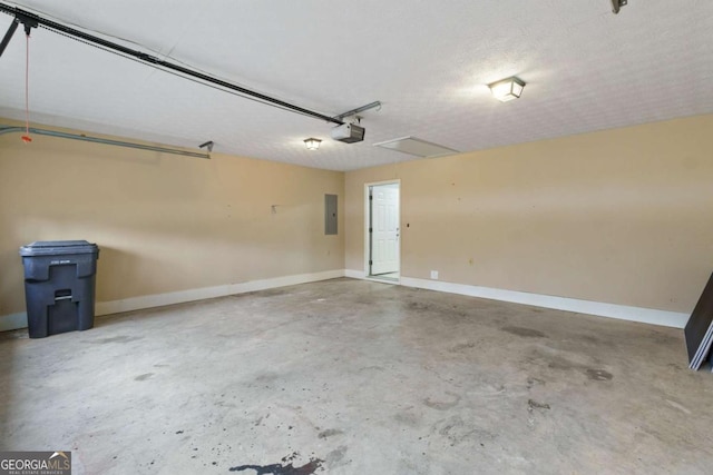 garage featuring a garage door opener and electric panel