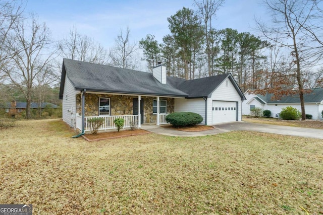 view of front facade featuring a garage, covered porch, and a front lawn