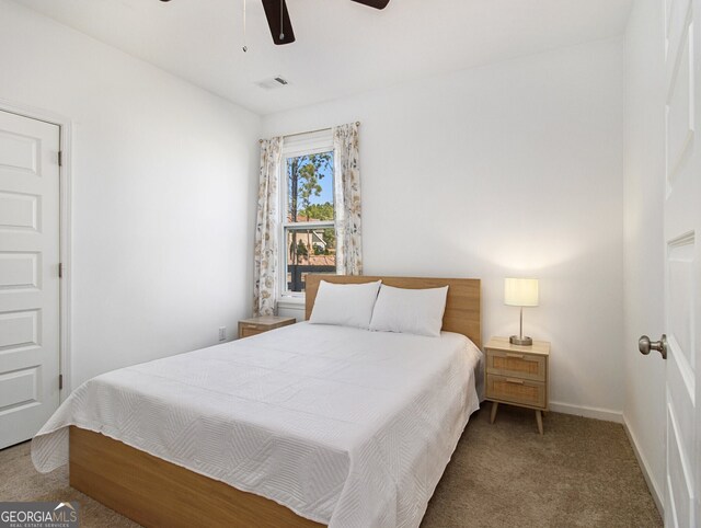 carpeted bedroom featuring ceiling fan