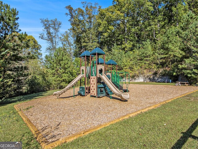 view of yard with a playground