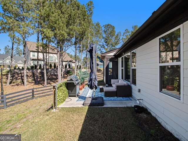 view of yard featuring an outdoor living space and a patio