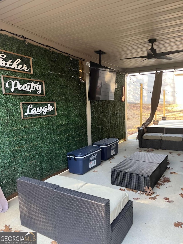 view of patio featuring ceiling fan