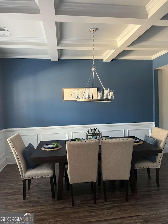 dining room featuring coffered ceiling, a notable chandelier, dark wood-type flooring, and beamed ceiling