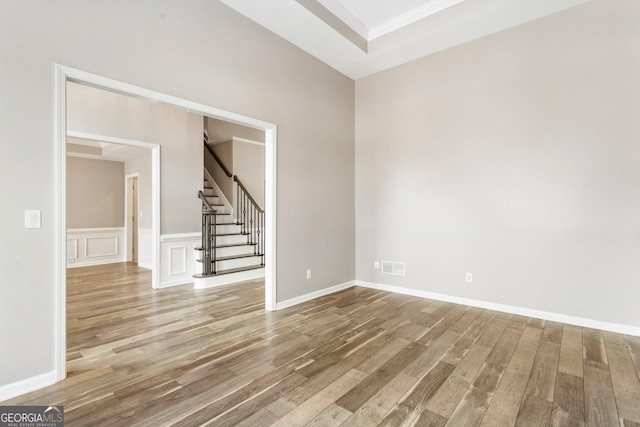 unfurnished room featuring hardwood / wood-style flooring