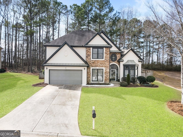 front of property featuring a garage and a front lawn